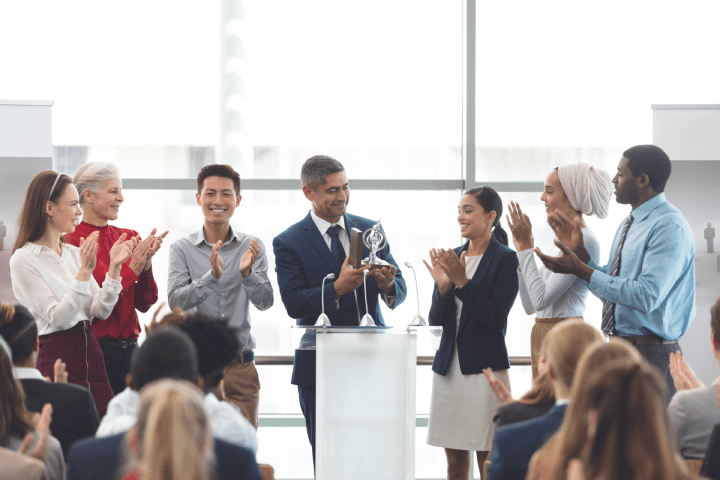 Businessman-receiving-award-employee-recognition