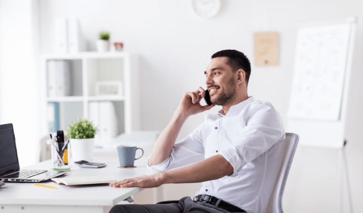 man in home office on phone