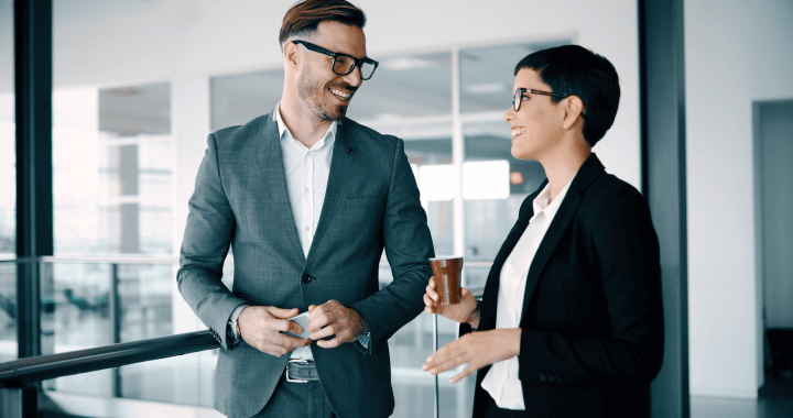 male and female digital project managers networking together