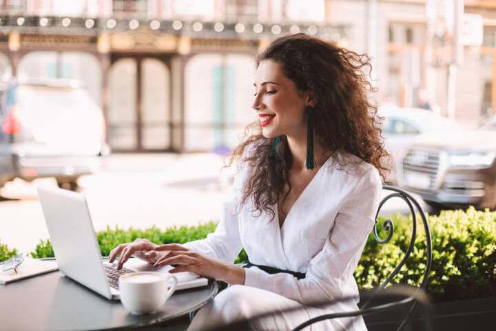 woman using laptop outside