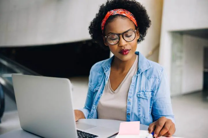 woman learning new skills using her computer