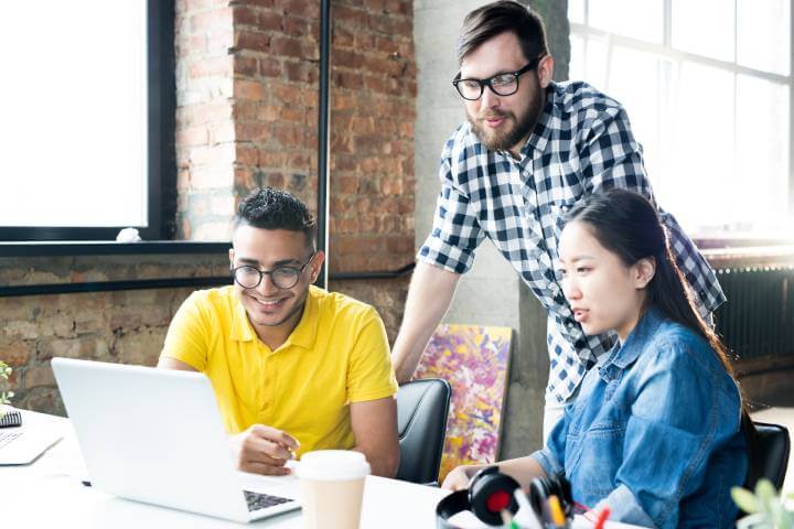 employees upskilling on laptop