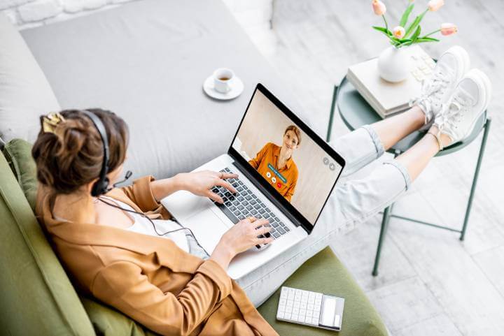 woman learning synchronously on laptop