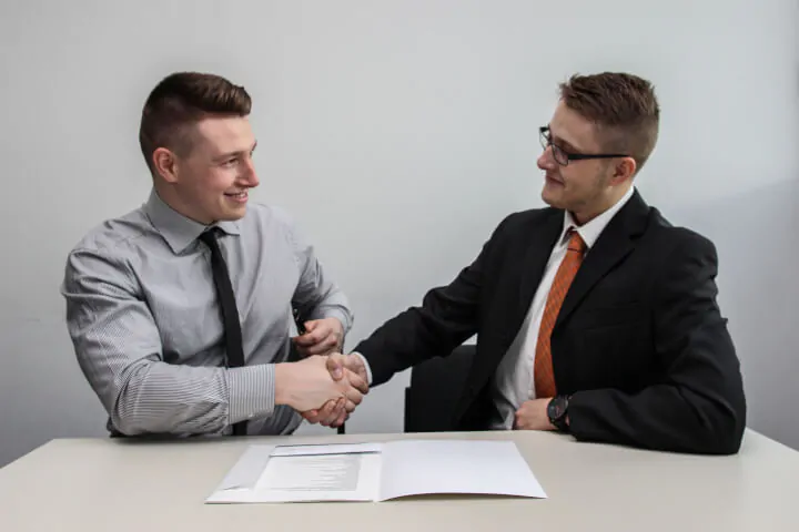 hiring manager welcoming applicant to new job