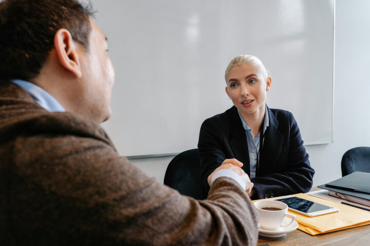 empathetic manager speaking with worker